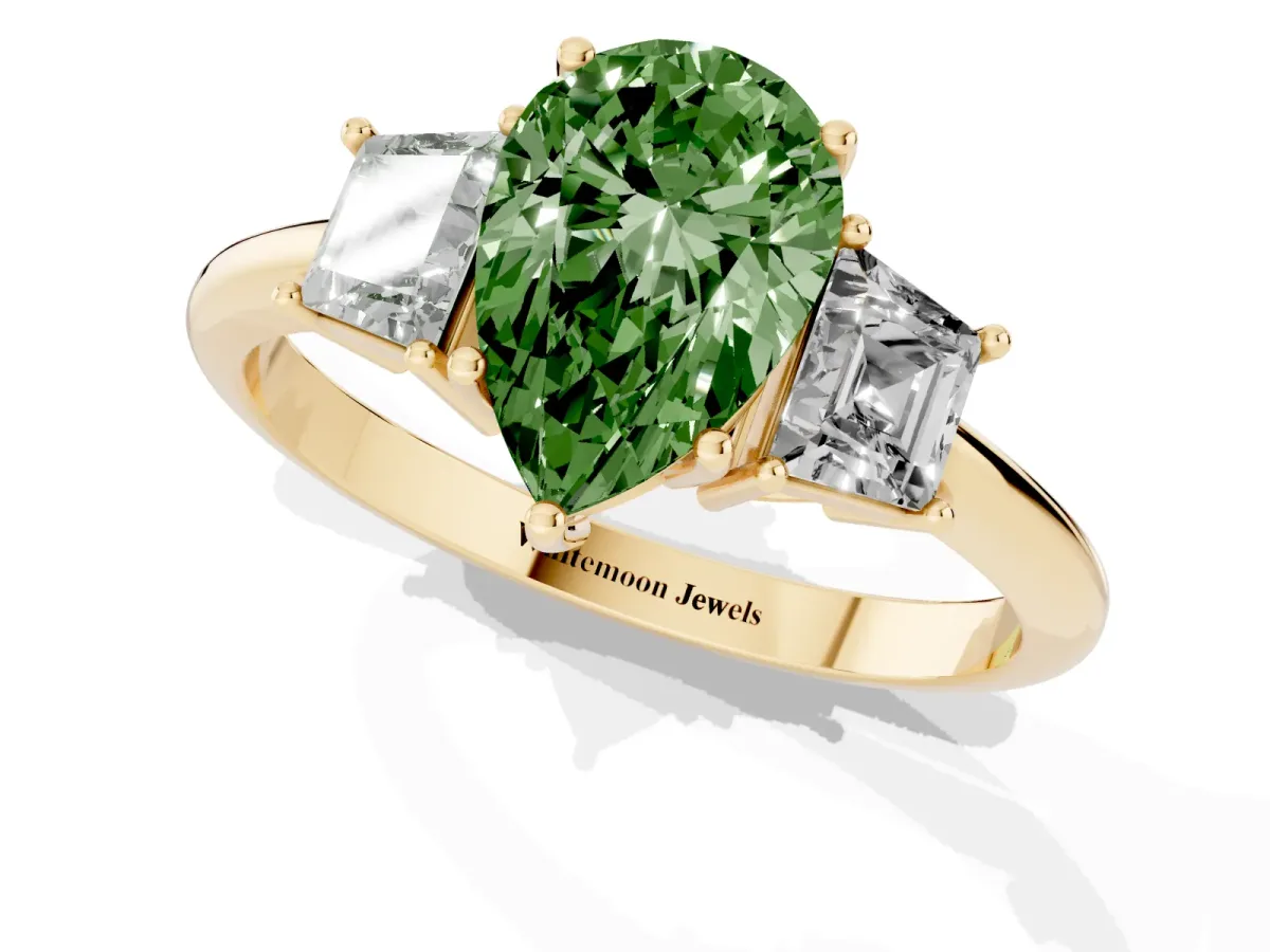 Fancy Green Pear Cut Diamond Three-Stone Ring with Trapezoid Side Stones and Prong Setting Yellow gold
