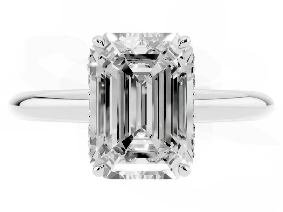 Emerald Cut Brilliant Solitaire Engagement Ring with Six-Prong Setting and Classic Band Platinum
