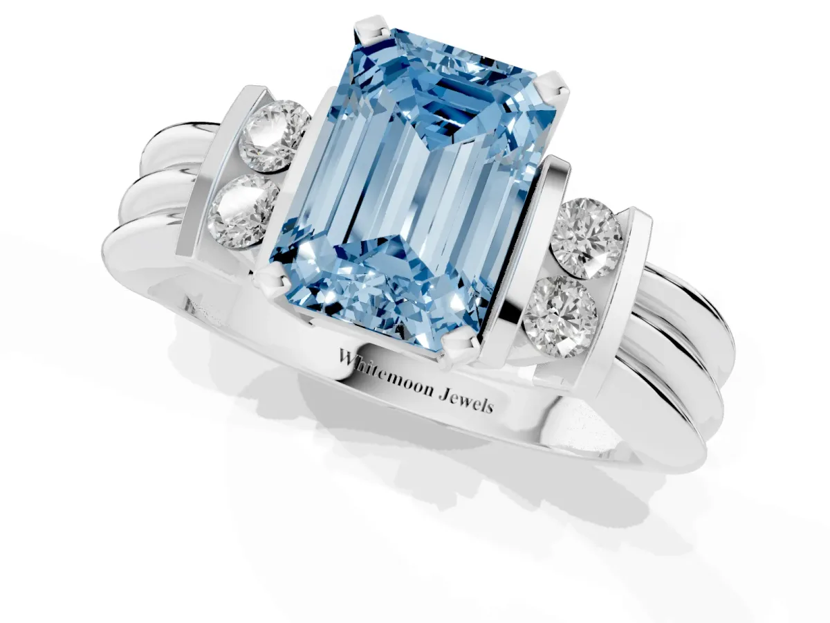 Fancy Blue Emerald Cut Cut Three-Stone Channel Set Ring with Bar Prongs Platinum