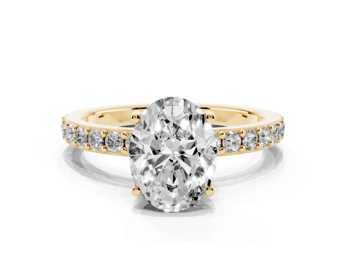 Oval Cut Cut Diamond Solitaire with Pave Band and Four-Prong Setting Yellow gold