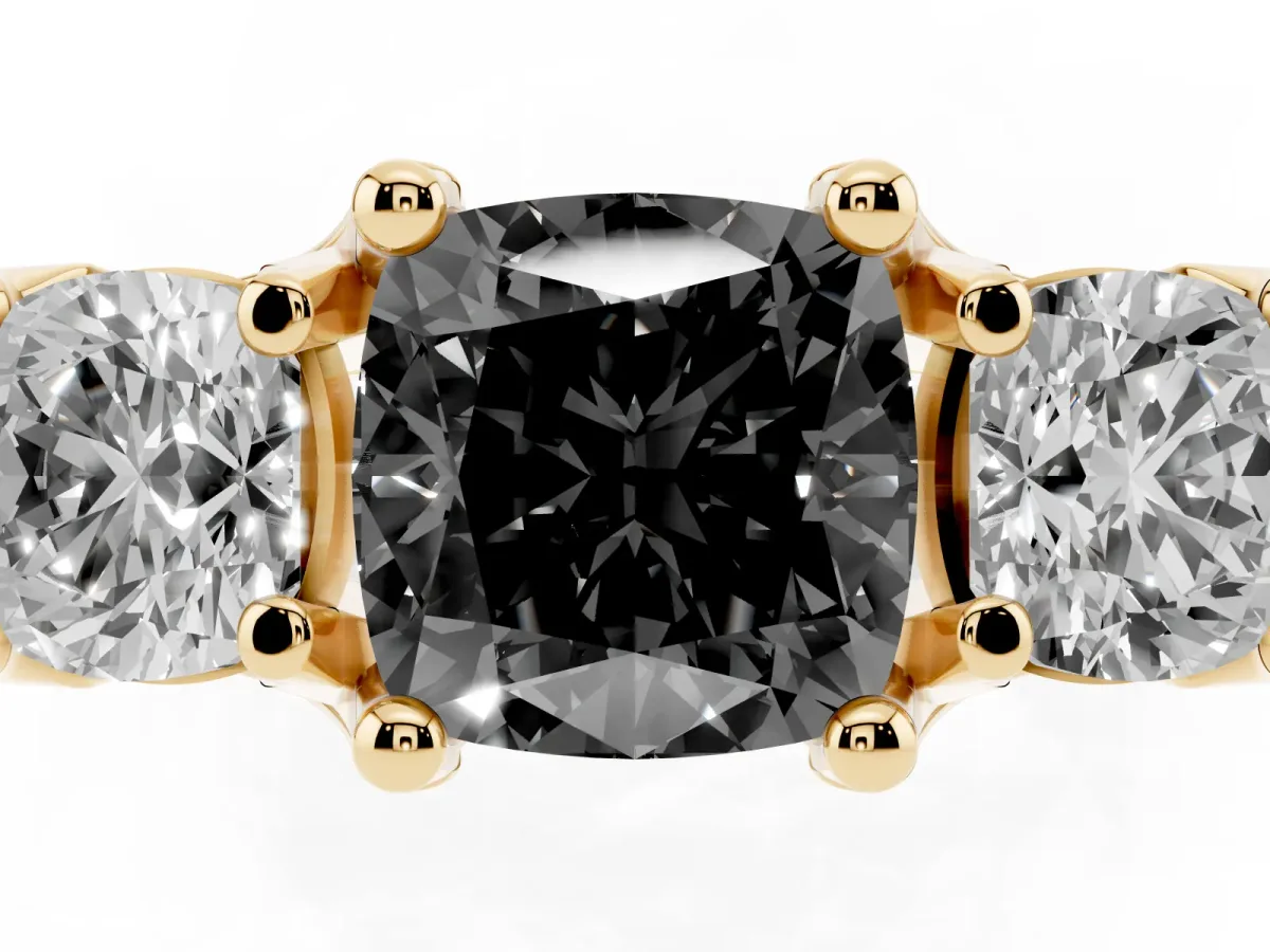 Fancy Black Cushion Cut Diamond Three-Stone Ring with Channel Set Band and Four-Prong Setting Yellow gold