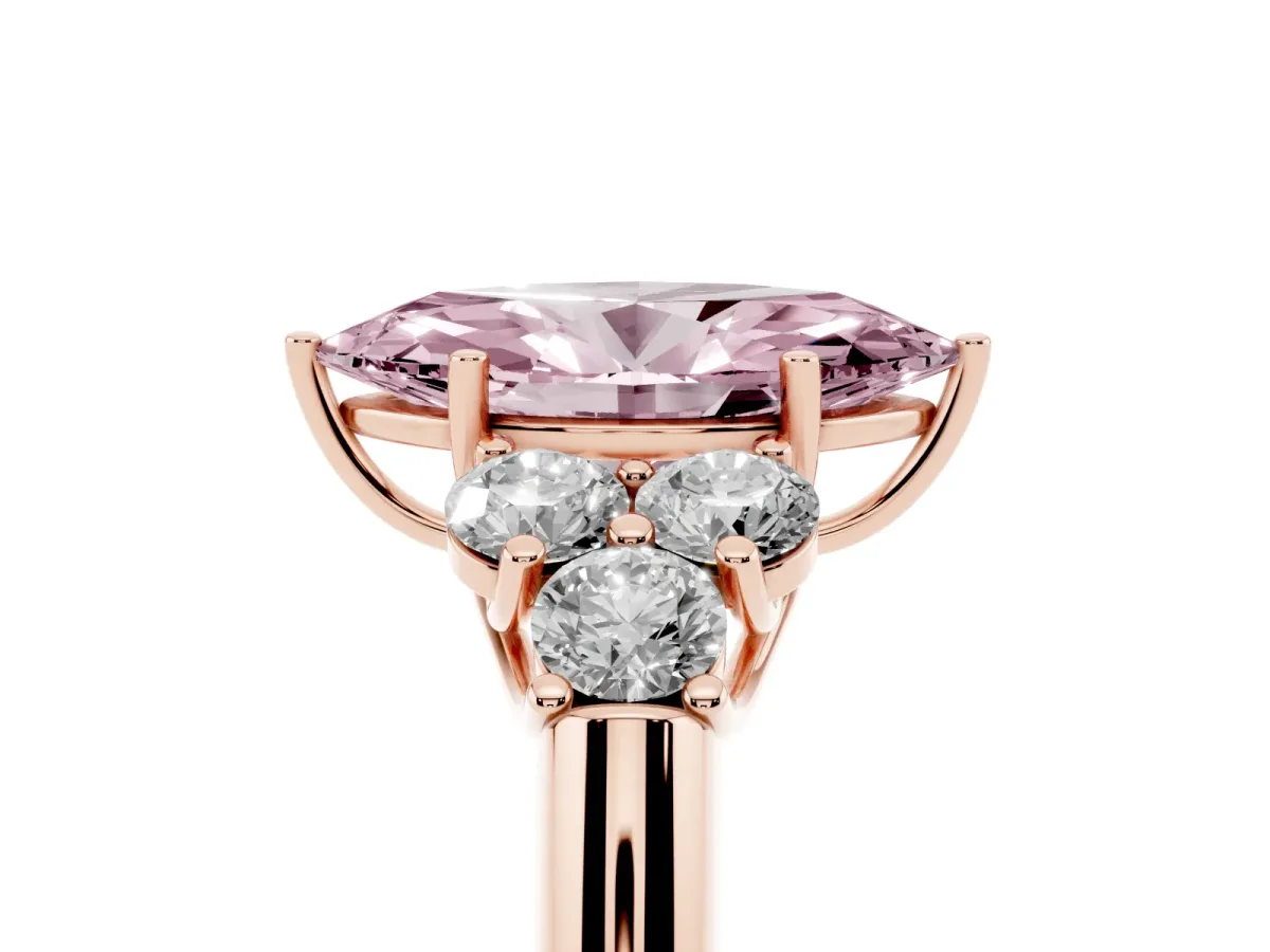Fancy Pink Marquise Cut Cut Diamond Cluster Ring with Round Accent Stones and Prong Setting on a Classic Band Rose gold