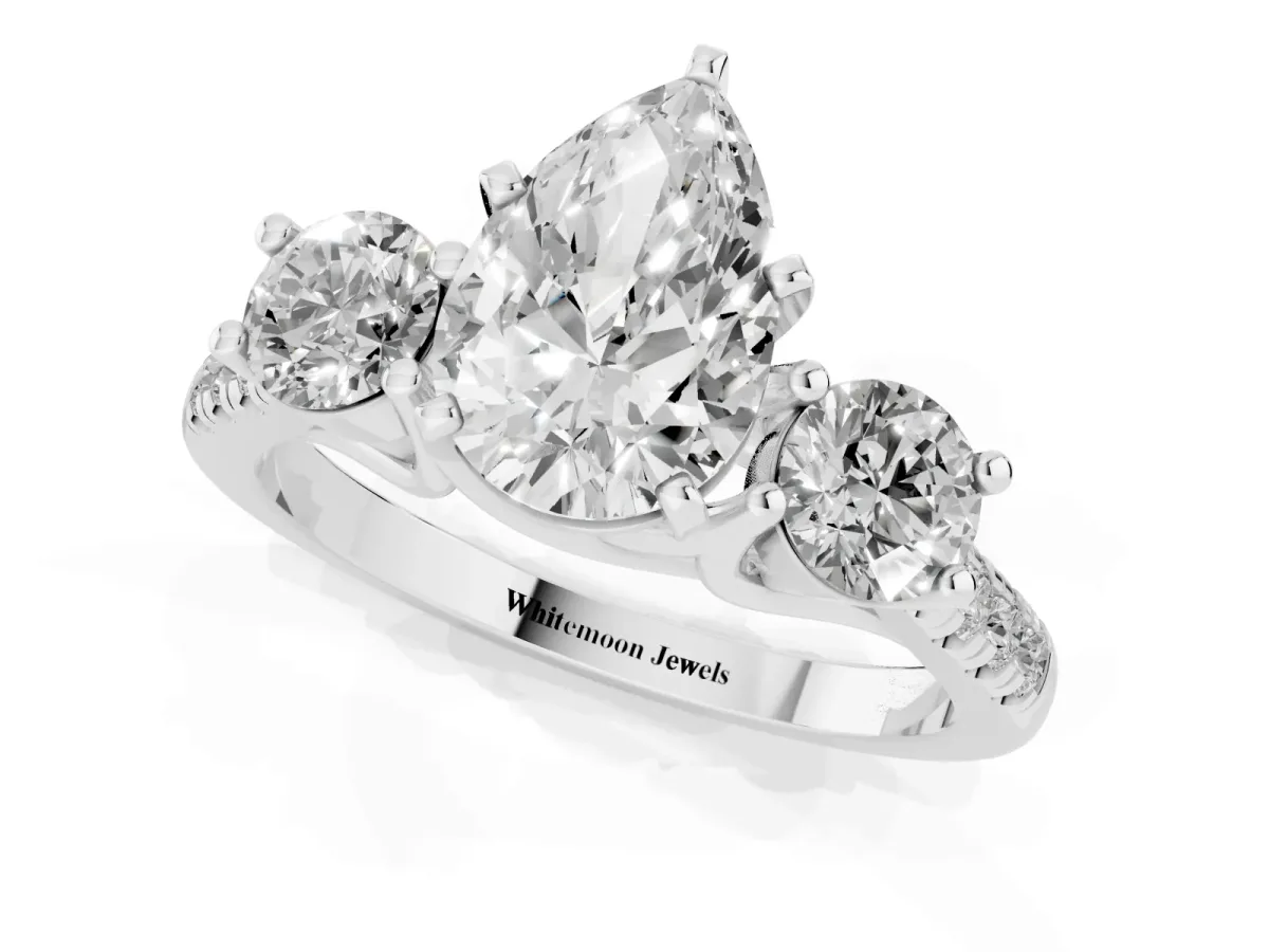 Three-Stone Pear Cut Diamond Pavé Band with Four-Prong Setting Platinum