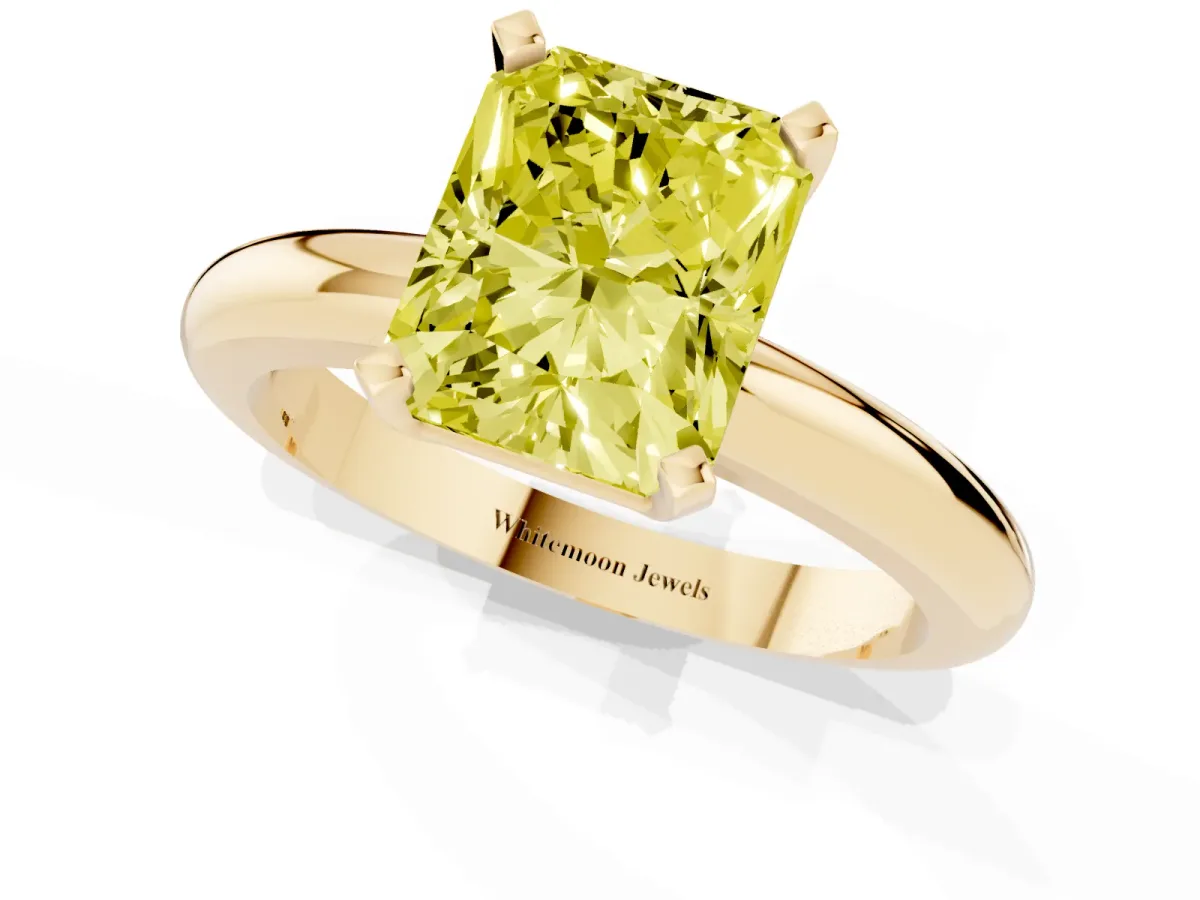 Fancy Yellow Radiant Cut Diamond Solitaire Engagement Ring with Round Band and Four-Prong Setting Yellow gold