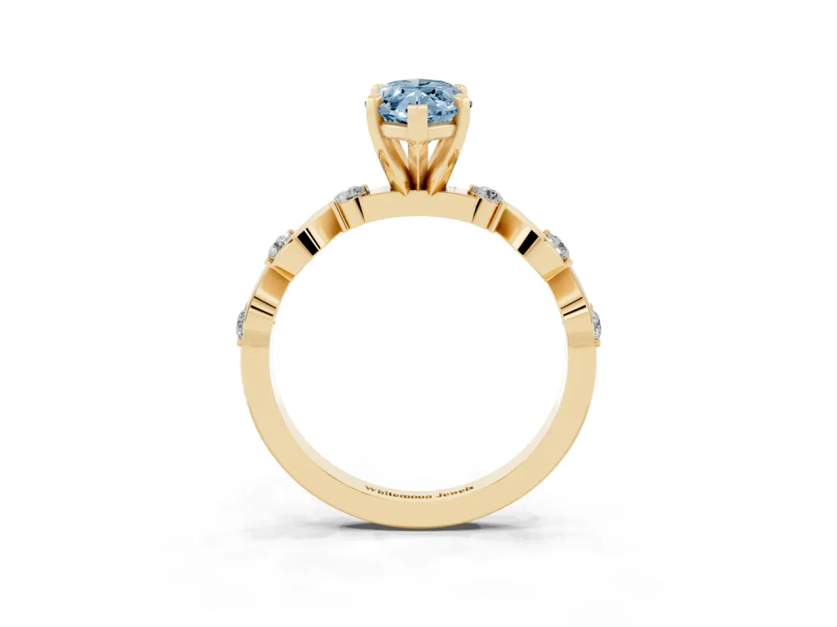 Fancy Blue Marquise Cut Diamond Solitaire Twisted Band with Round Accents and Prong Setting Yellow gold