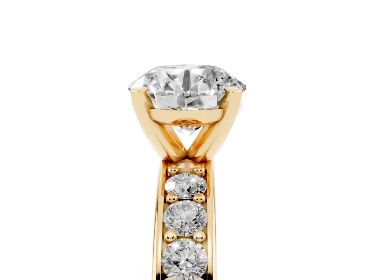 Round Cut Diamond Engagement Ring with Channel Set Round Band and Prong Setting Yellow gold