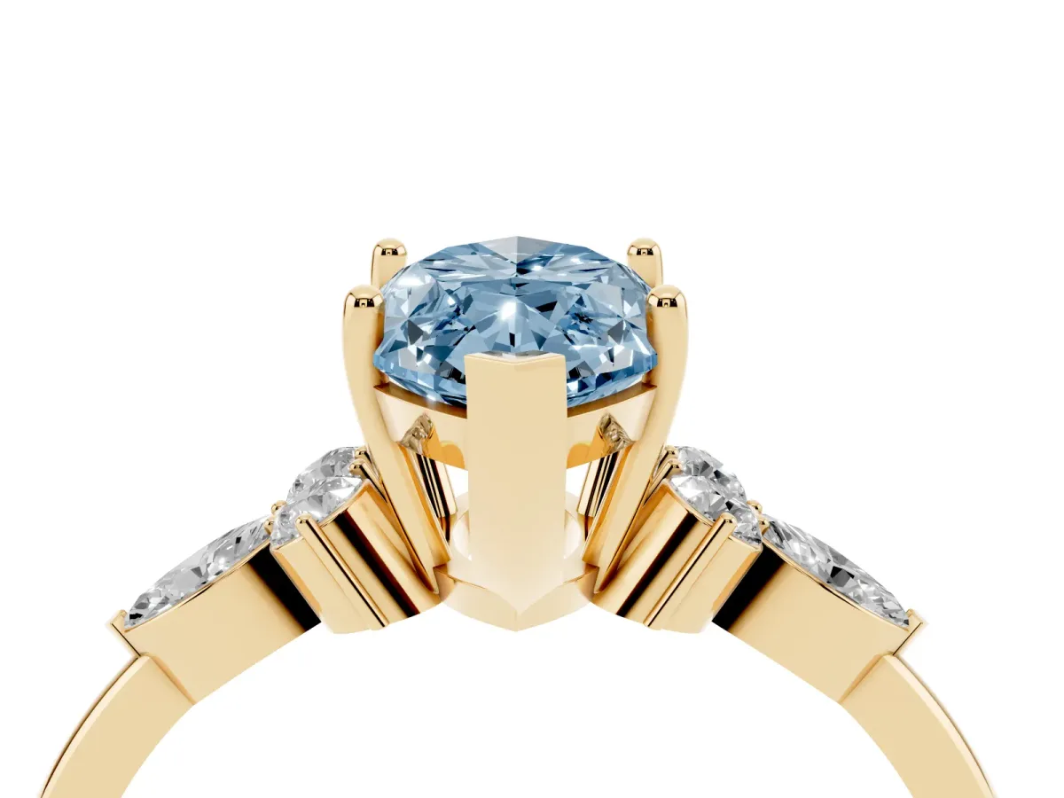 Fancy Blue Marquise Cut Brilliant Diamond Solitaire Ring with Pear Side Stones and Four-Prong Setting Yellow gold