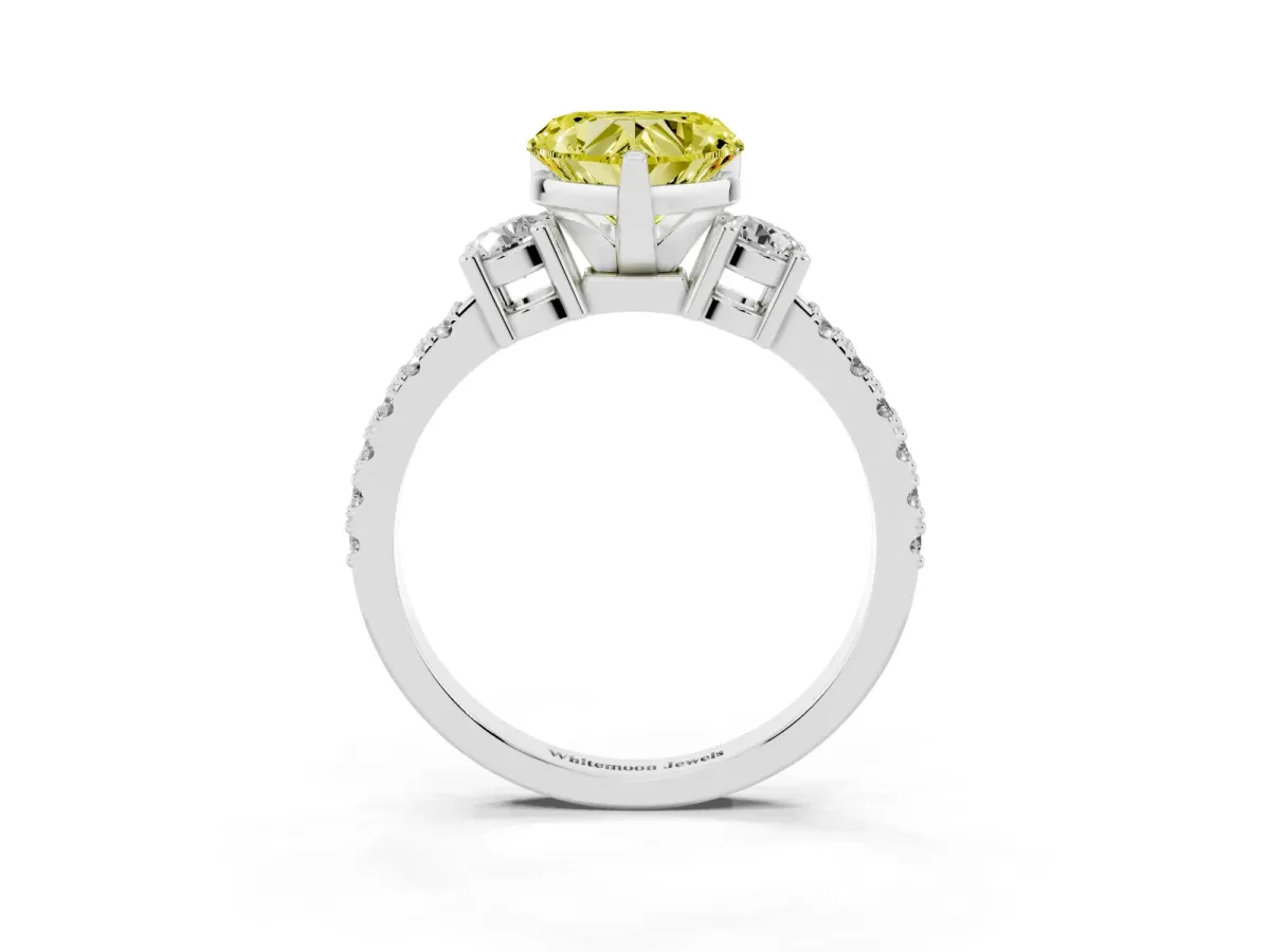 Fancy Yellow Heart Cut Three-Stone Diamond Pavé Band with Prong Setting Platinum