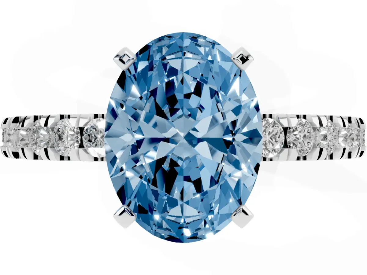 Fancy Blue Oval Cut Solitaire Diamond with Pavé Band and Four-Prong Setting Silver