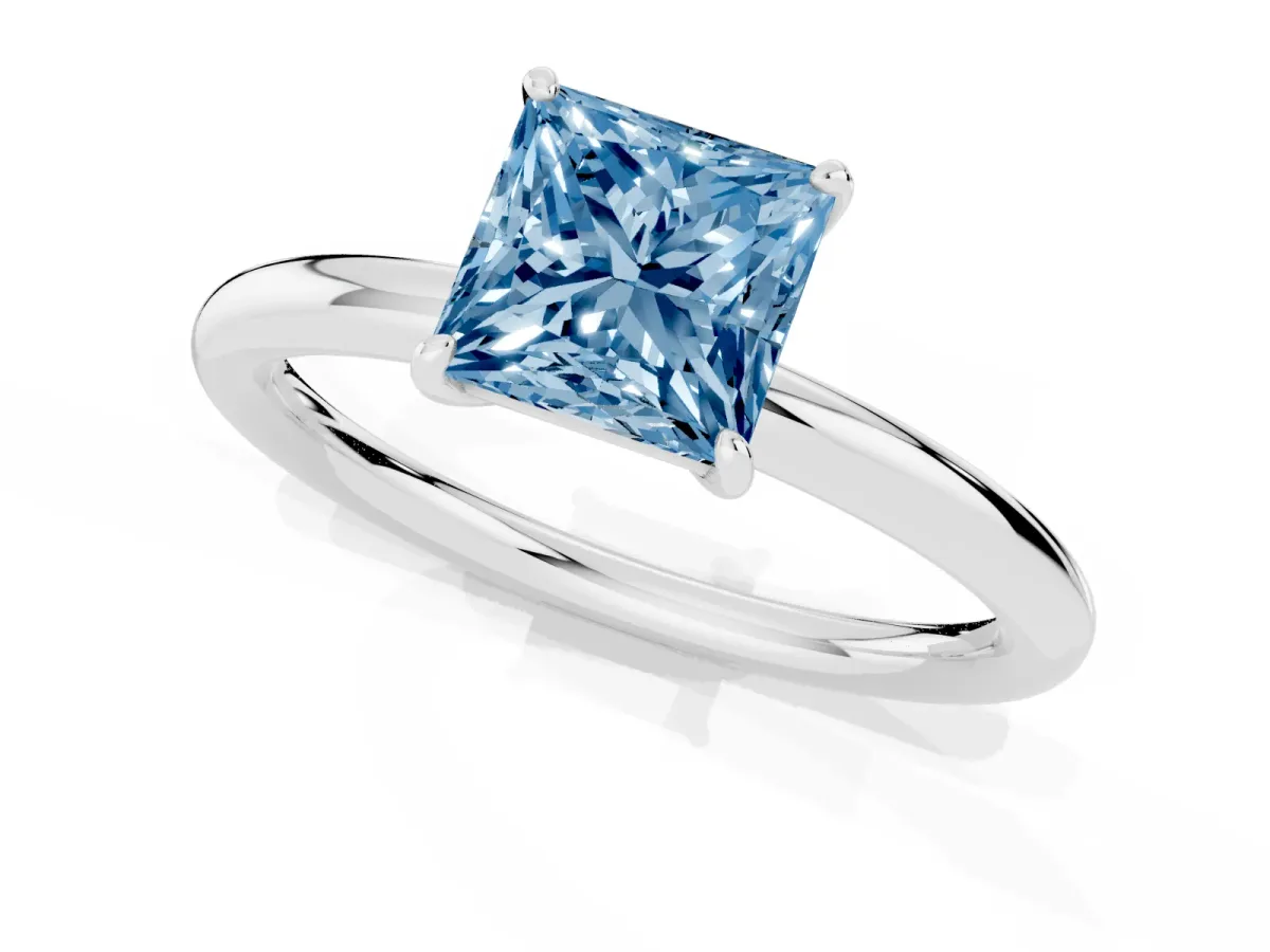 Fancy Blue Princess Cut Solitaire Diamond Ring with Four-Prong Setting on a Plain Band Platinum