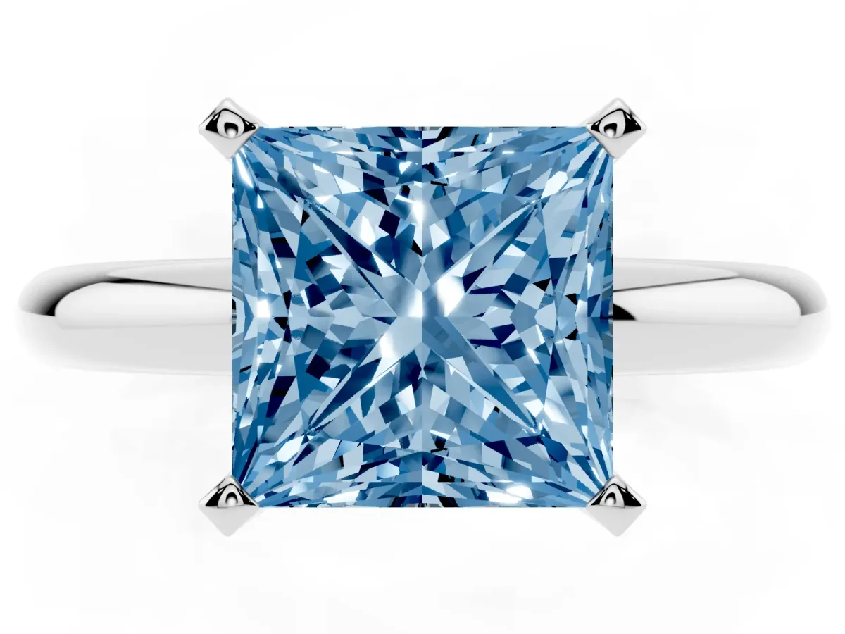 Fancy Blue Princess Cut Diamond Solitaire Engagement Ring with Round Band and Four-Prong Setting Silver
