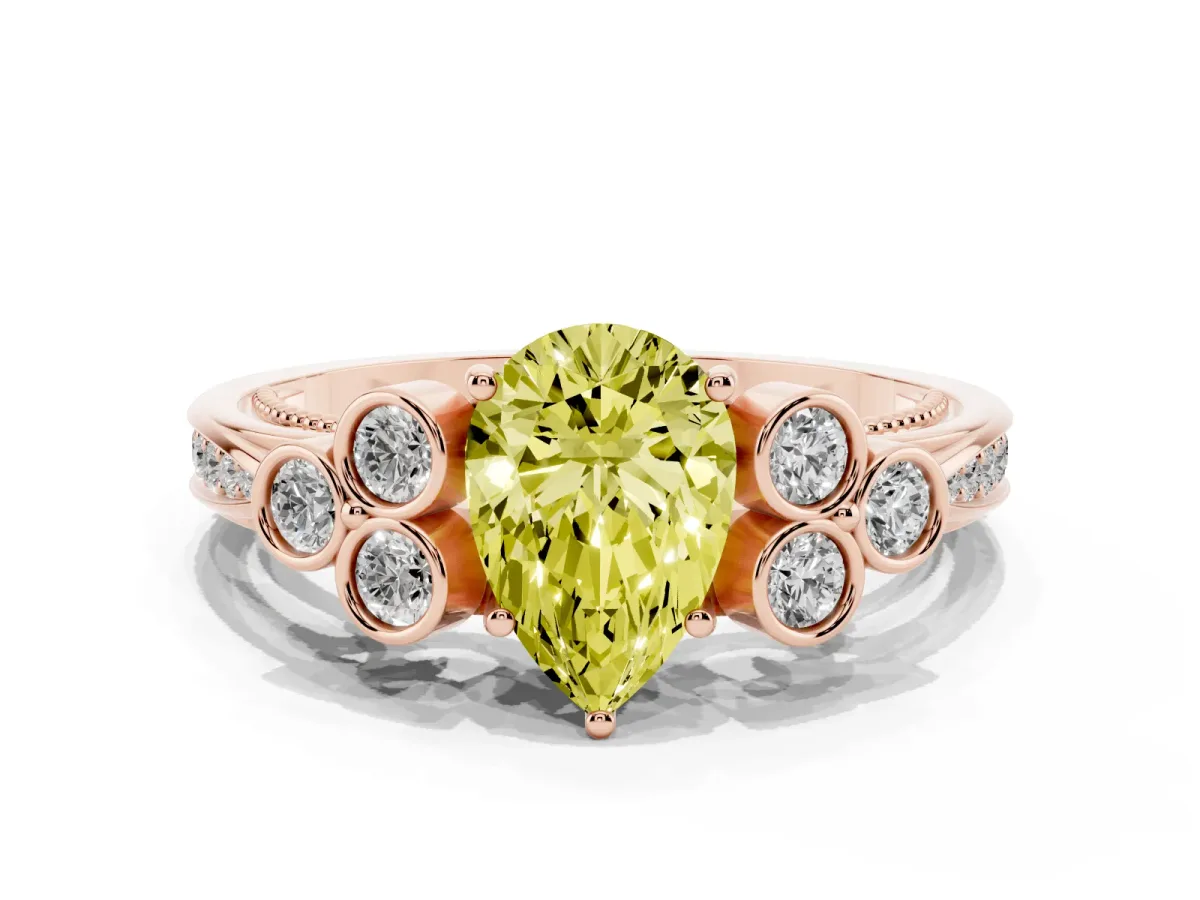 Fancy Yellow Pear Cut Cut Diamond Engagement Ring with Bezel Set Round Side Stones and Prong Setting Rose gold