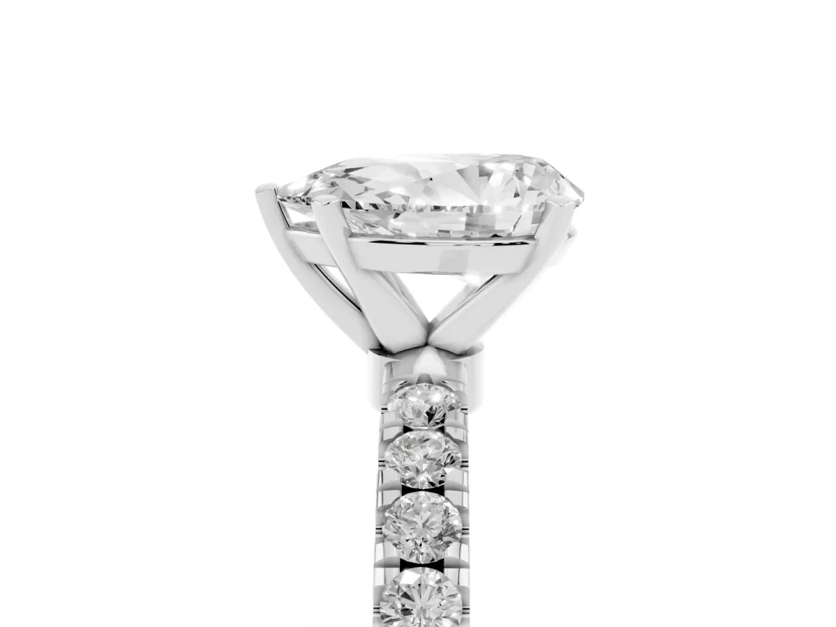 Pear Cut Diamond Solitaire Ring with Pavé Accents and Four-Prong Setting Silver