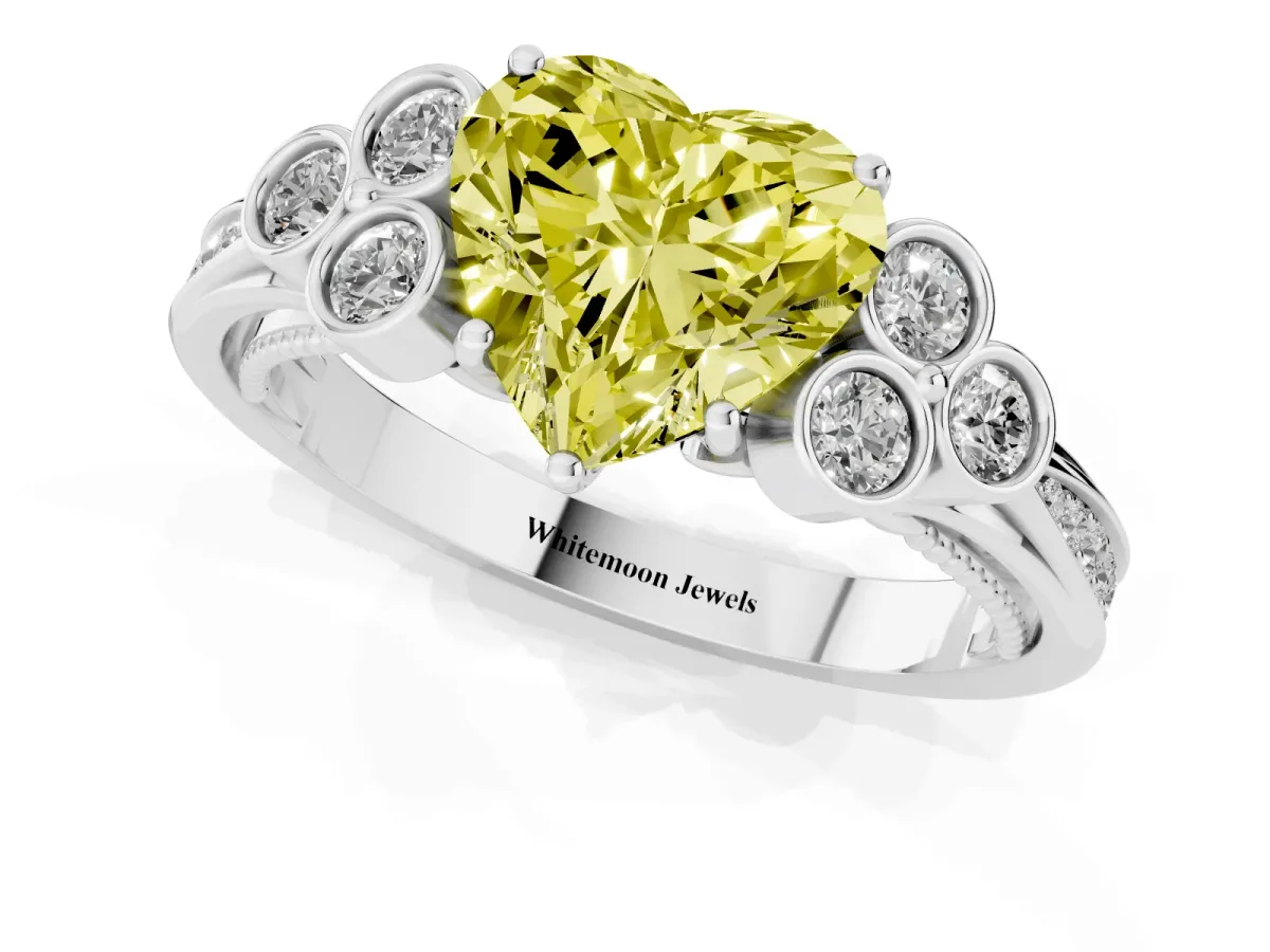 Fancy Yellow Heart Cut Cut Diamond Engagement Ring with Bezel Set Round Side Stones and Prong Setting White gold