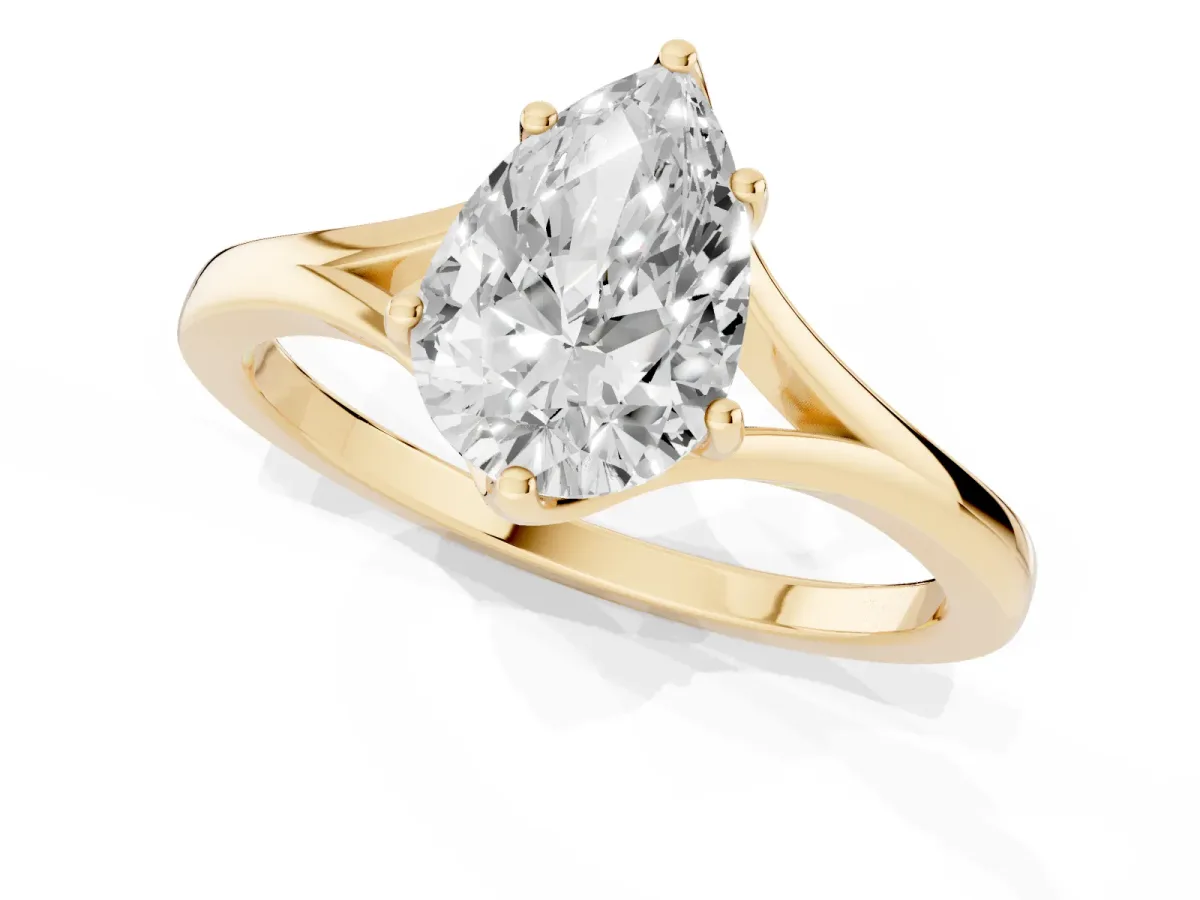 Pear Cut Solitaire Diamond Ring with Six-Prong Setting and Tapered Band Yellow gold