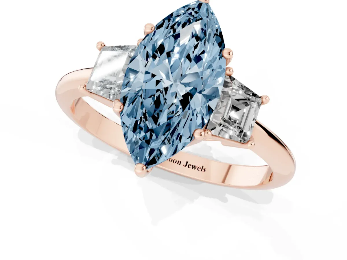 Fancy Blue Marquise Cut Diamond Three-Stone Ring with Trapezoid Side Stones and Prong Setting Rose gold