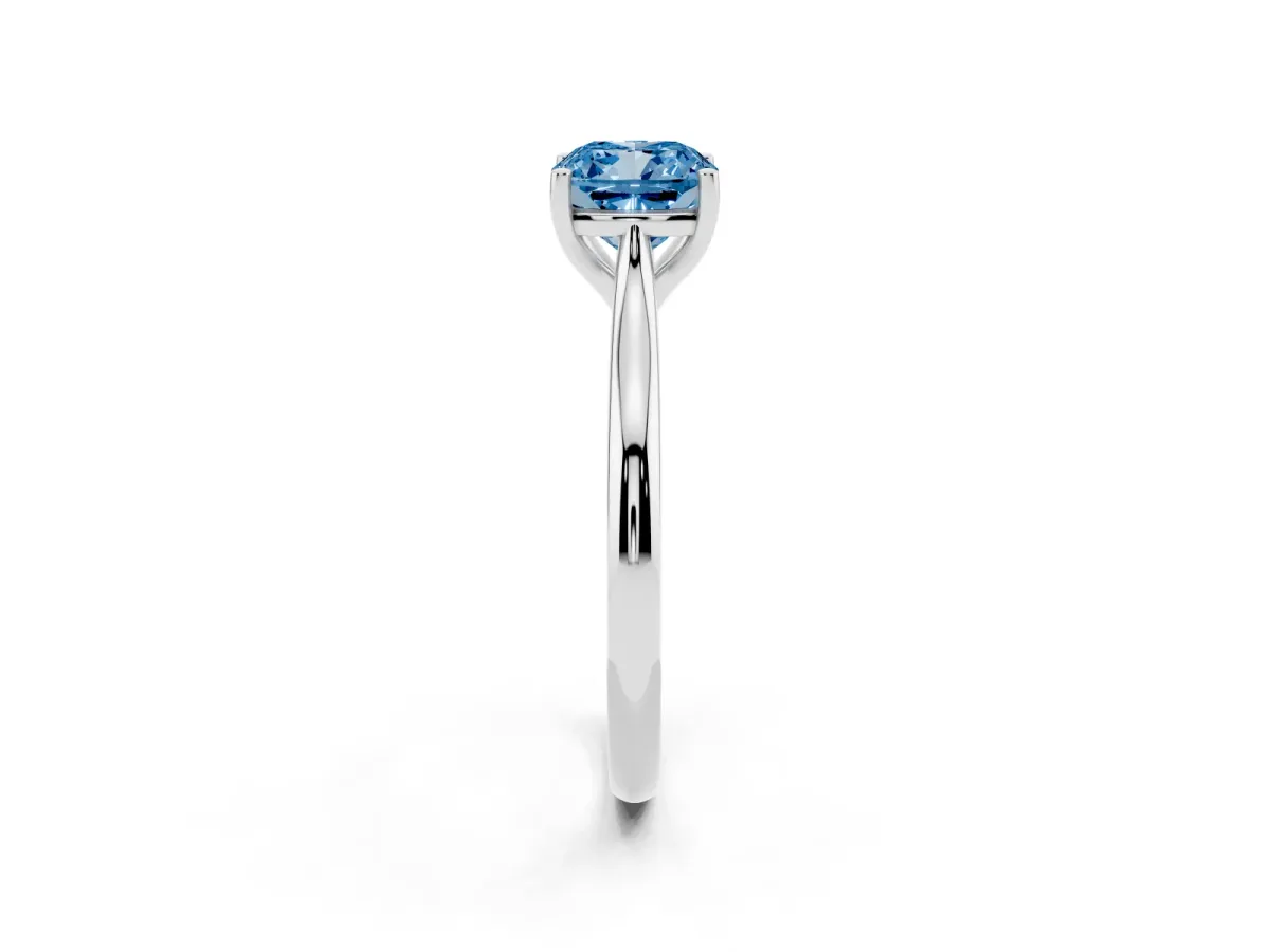 Fancy Blue Cushion Cut Cut Solitaire Ring with Cathedral Band and Four-Prong Setting Silver