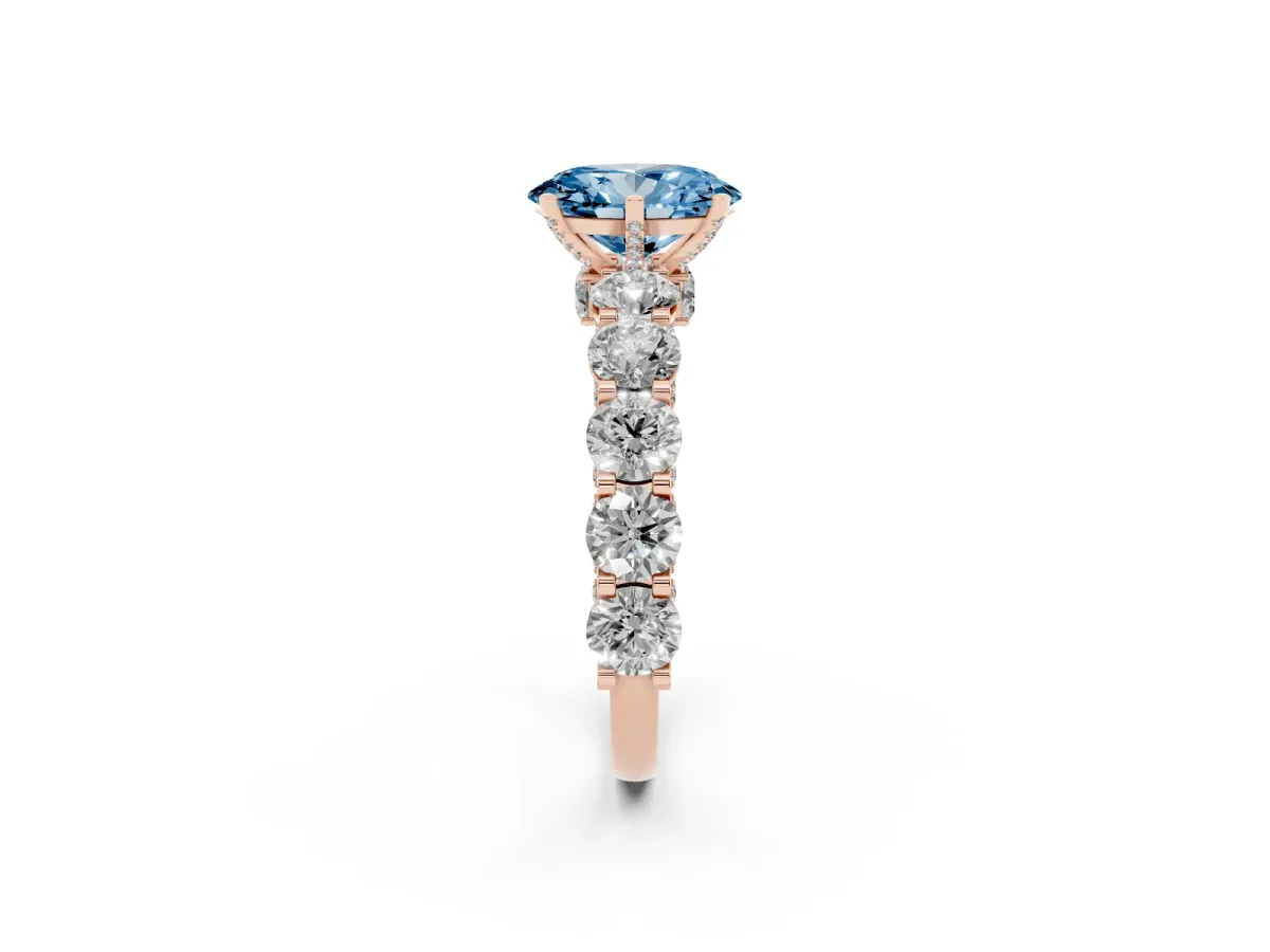 Fancy Blue Oval Cut Diamond Side Stone Engagement Ring with Four-Prong Setting Rose gold
