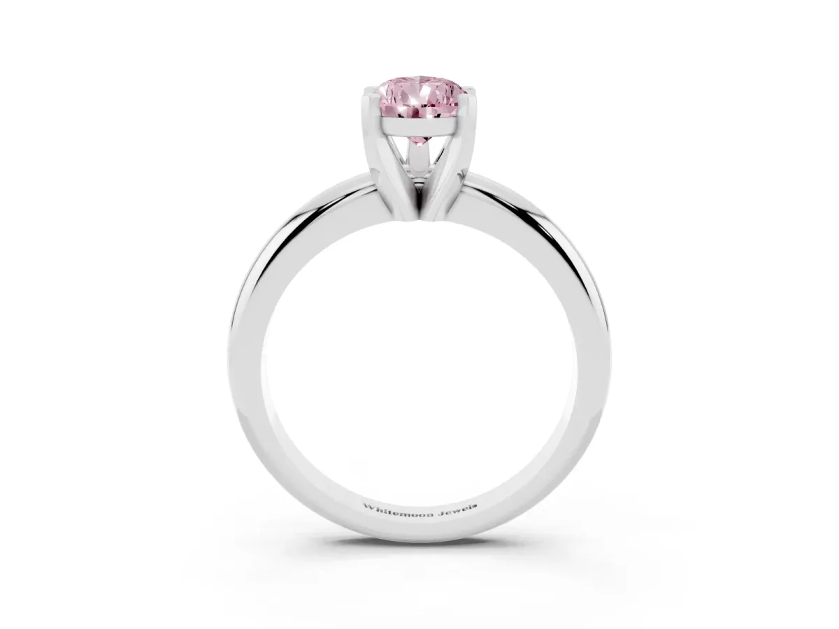 Fancy Pink Pear Cut Diamond Solitaire Engagement Ring with Round Band and Four-Prong Setting Platinum