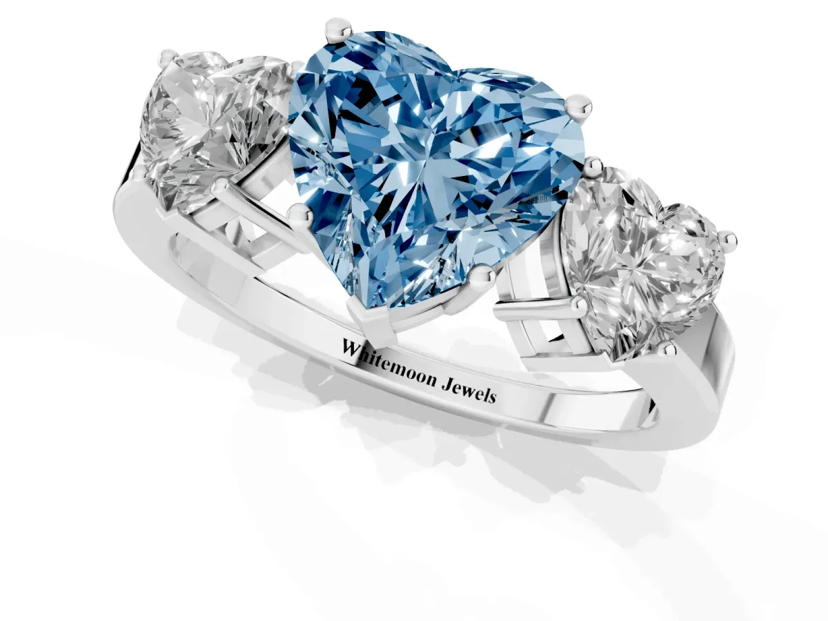 Fancy Blue Three-Stone Heart Cut Cut Diamond Engagement Ring with Flat Band and Four-Prong Setting Silver