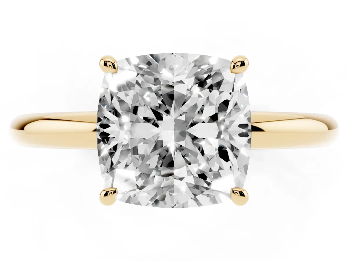 Cushion Cut Diamond Solitaire Ring with Thin Band and Four-Prong Setting Yellow gold