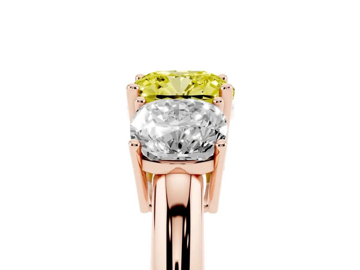 Fancy Yellow Three-Stone Cushion Cut Cut Diamond Engagement Ring with Prong Setting on a White Gold Band Rose gold