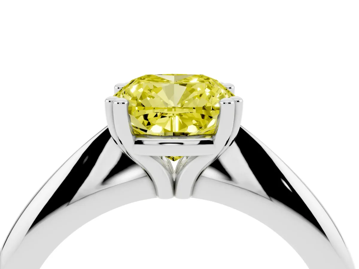 Fancy Yellow Cushion Cut Cut Solitaire Engagement Ring with Tapered Band and Four-Prong Setting Platinum