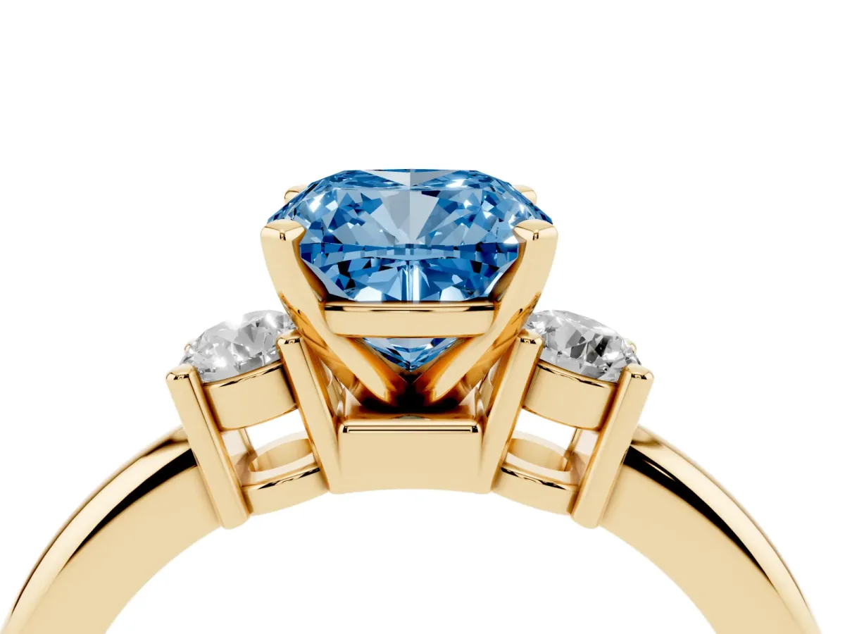 Fancy Blue Three-Stone Cushion Cut Cut Diamond Solitaire with Prong Setting and Classic Band Yellow gold