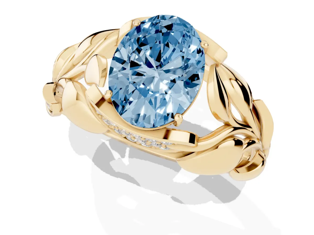 Fancy Blue Oval Cut Diamond Leaf-Inspired Engagement Ring with Round Accents and Prong Setting Yellow gold