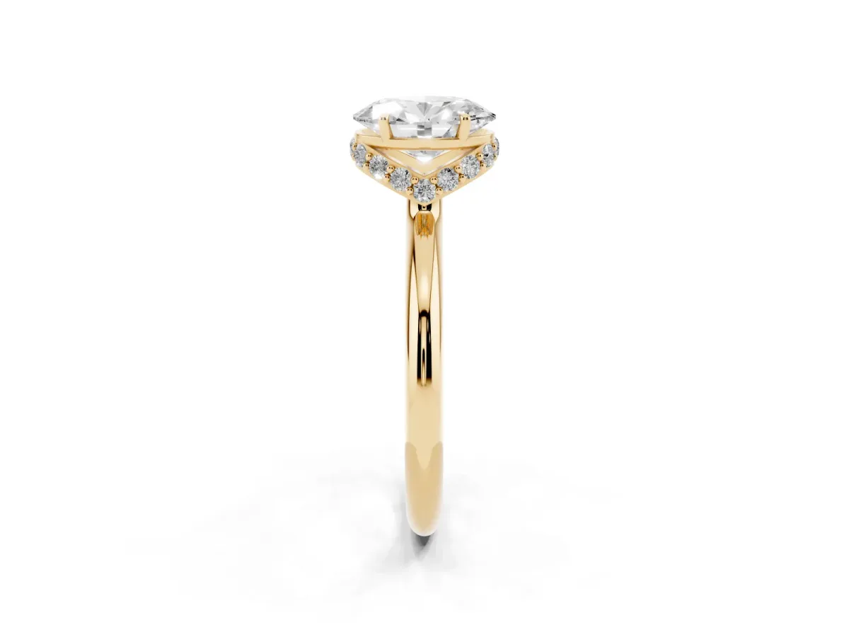 Oval Cut Brilliant Solitaire Engagement Ring with Six-Prong Setting and Classic Band Yellow gold