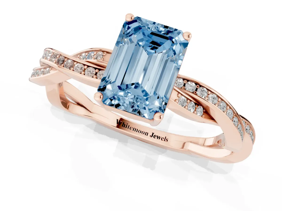 Fancy Blue Emerald Cut Solitaire Twisted Pave Diamond Ring with Four-Prong Setting Rose gold