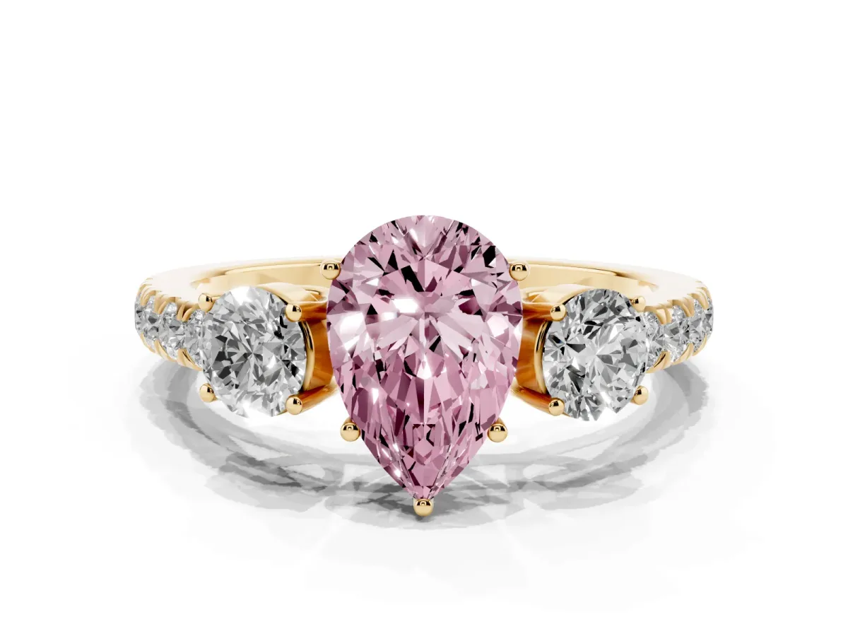 Fancy Pink Pear Cut Cut Diamond Three-Stone Ring with Round Side Stones and Pavé Band Yellow gold