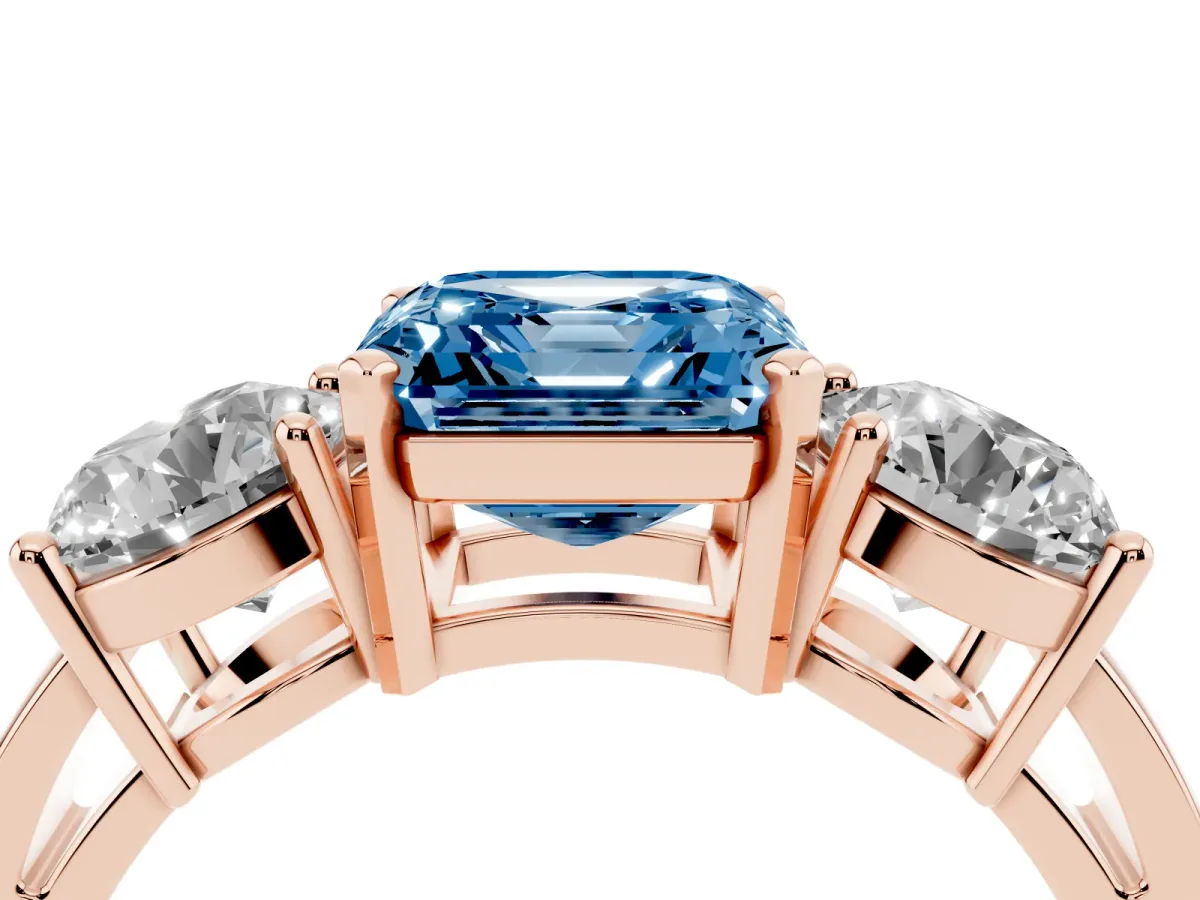 Fancy Blue Three-Stone Asscher Cut Diamond Ring with Round Side Stones, Classic Band, and Four-Prong Setting Rose gold