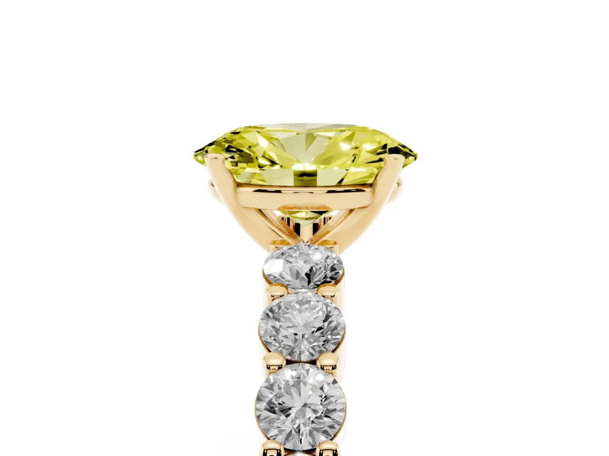 Fancy Yellow Oval Cut Diamond Solitaire Ring with Shared Prong Round Side Stones Yellow gold