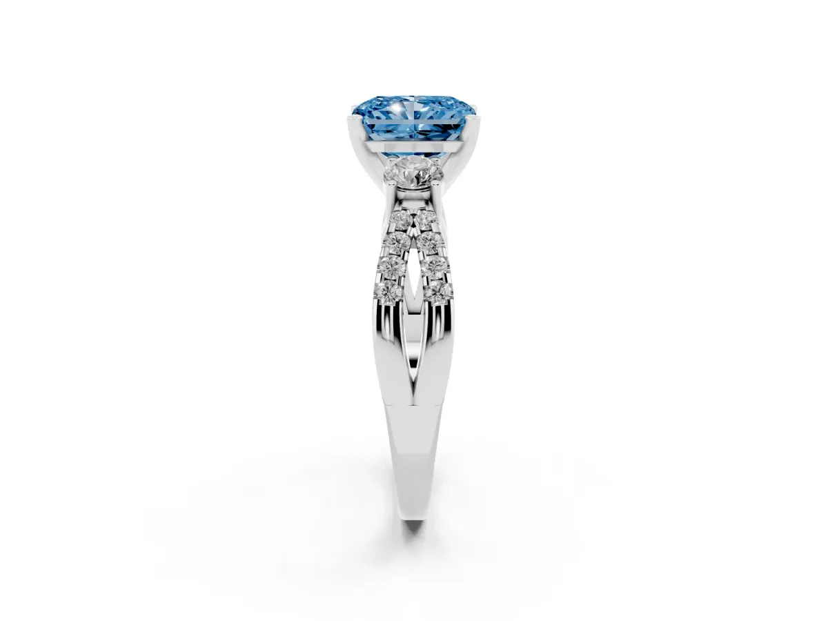 Fancy Blue Radiant Cut Diamond Three-Stone Ring with Pavé Split Shank and Four-Prong Setting White gold