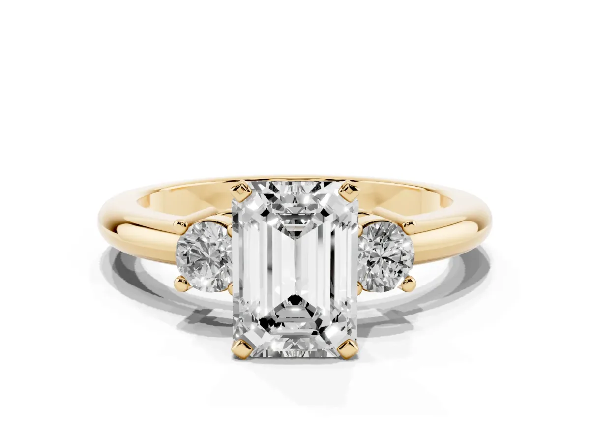 Three-Stone Emerald Cut Cut Diamond Solitaire with Prong Setting and Classic Band Yellow gold