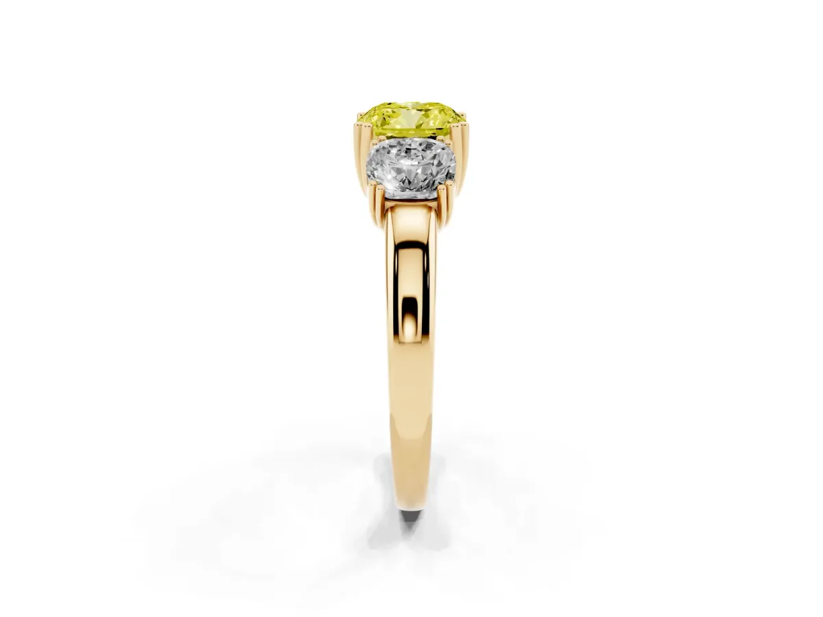 Fancy Yellow Three-Stone Cushion Cut Cut Diamond Ring with Channel Set Band and Four-Prong Setting Yellow gold