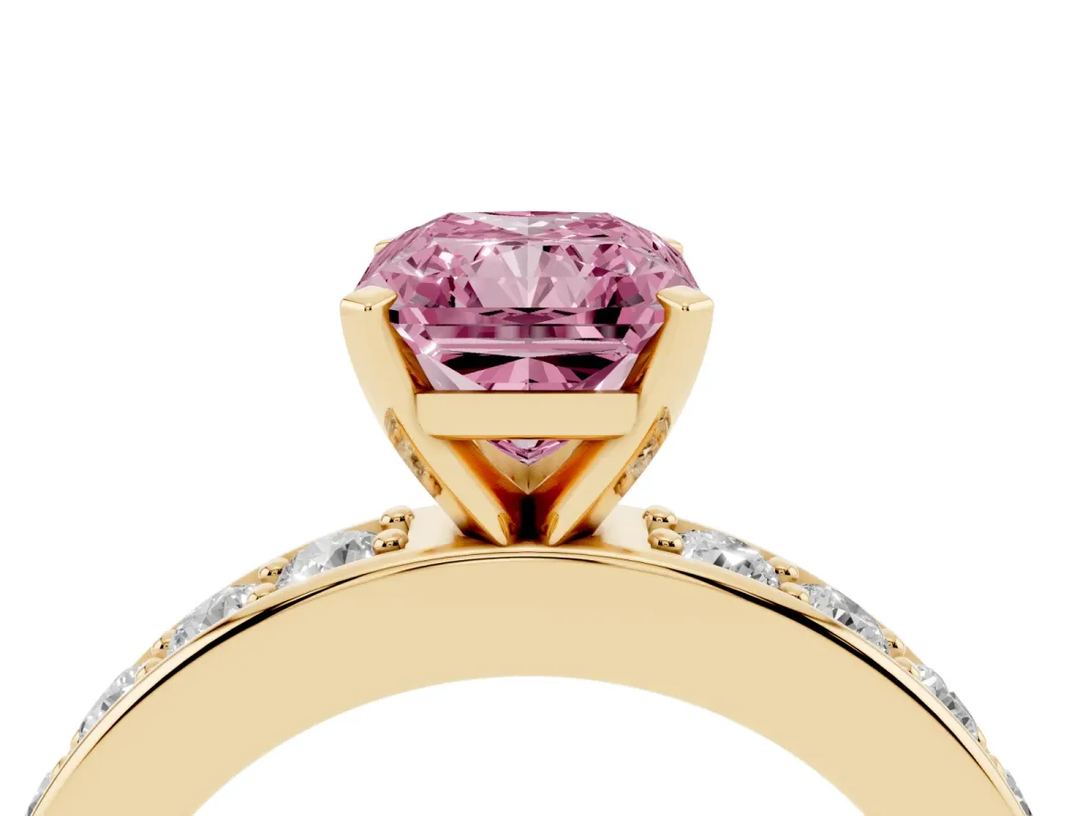 Fancy Pink Radiant Cut Diamond Engagement Ring with Channel Set Round Band and Prong Setting Yellow gold