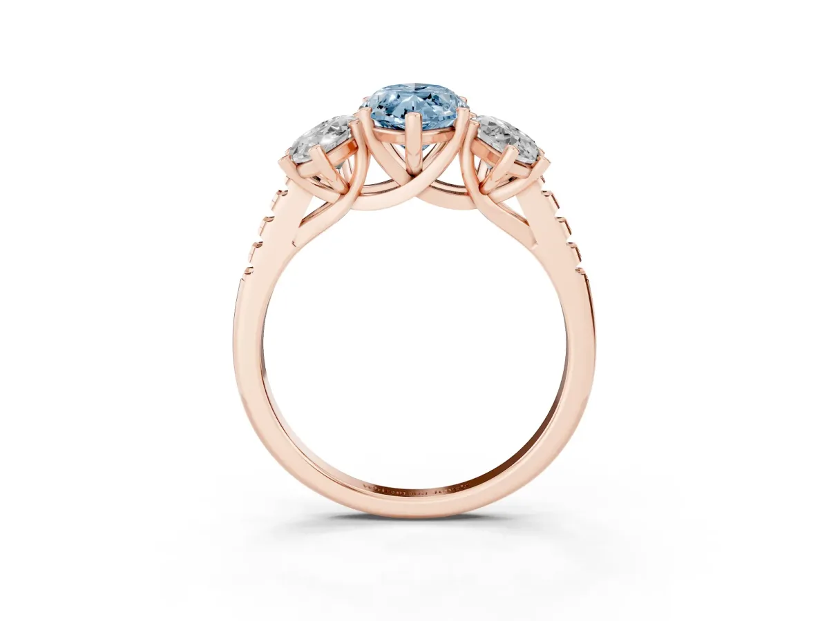 Fancy Blue Three-Stone Marquise Cut Diamond Ring with Round Pavé Band and Prong Setting Rose gold