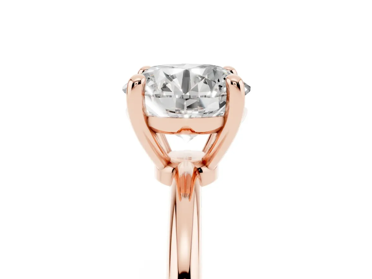 Round Cut Solitaire Diamond Ring with 4-Prong Setting on a Classic Band Rose gold