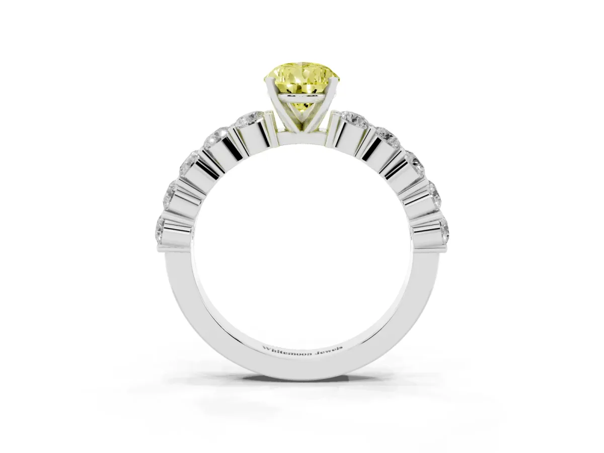 Fancy Yellow Pear Cut Diamond Solitaire Ring with Shared Prong Round Side Stones Silver