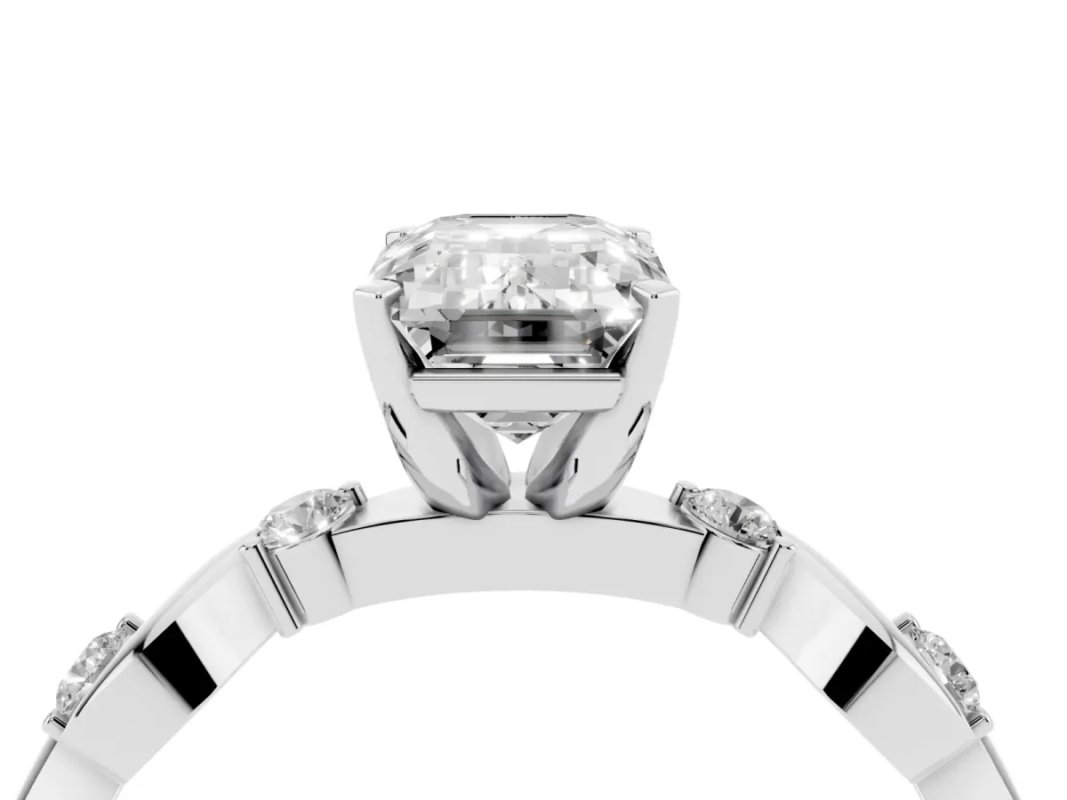 Emerald Cut Diamond Solitaire Twisted Band with Round Accents and Prong Setting Silver