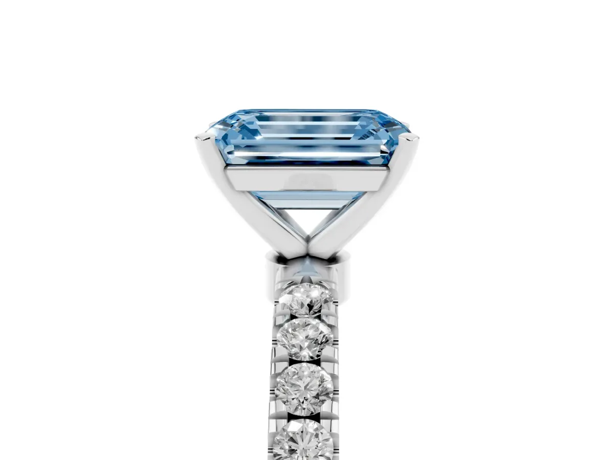 Fancy Blue Emerald Cut Diamond Solitaire Ring with Pavé Accents and Four-Prong Setting Platinum