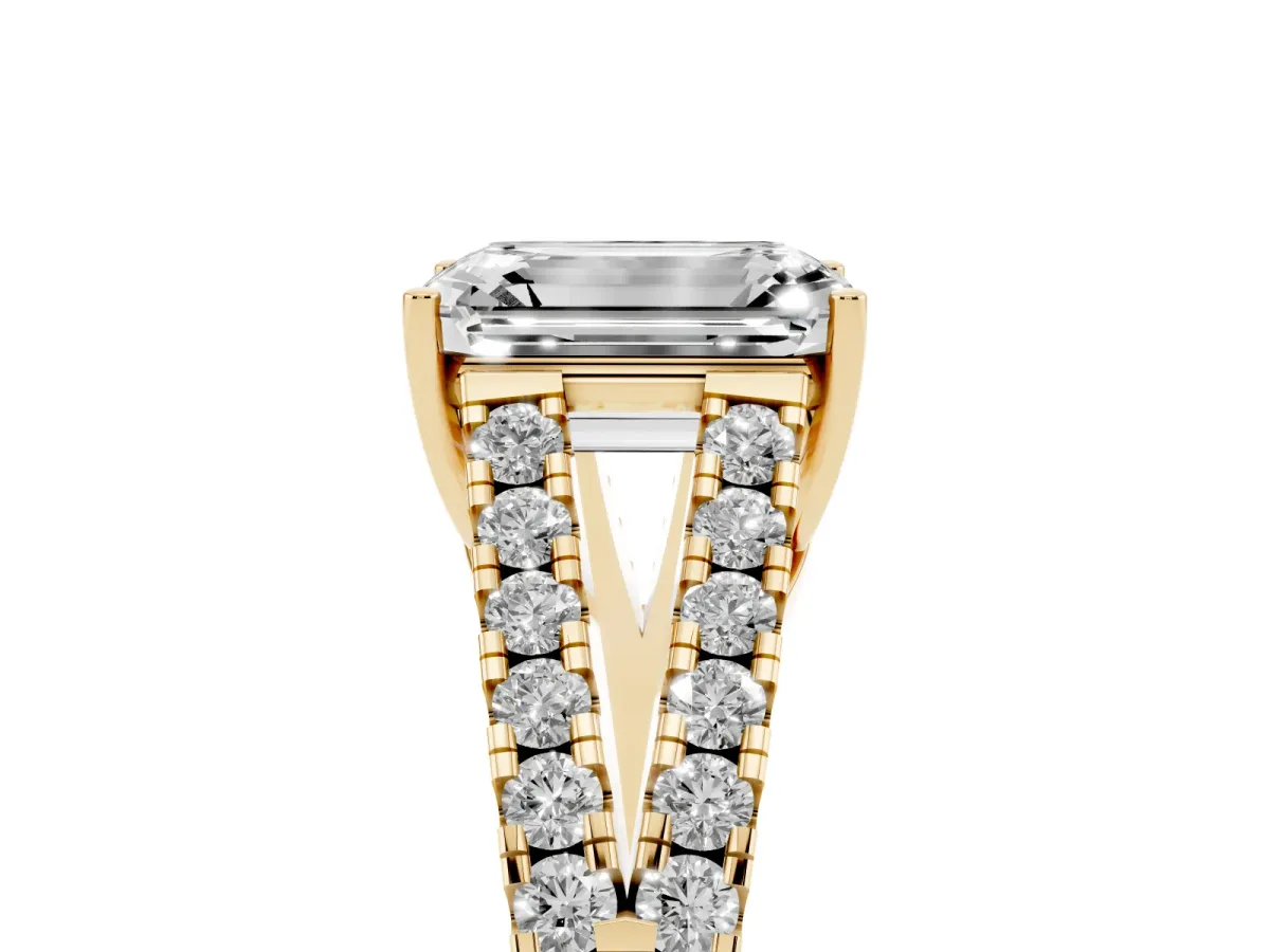 Emerald Cut Diamond Split Shank Engagement Ring with Round Pavé and Prong Setting Yellow gold
