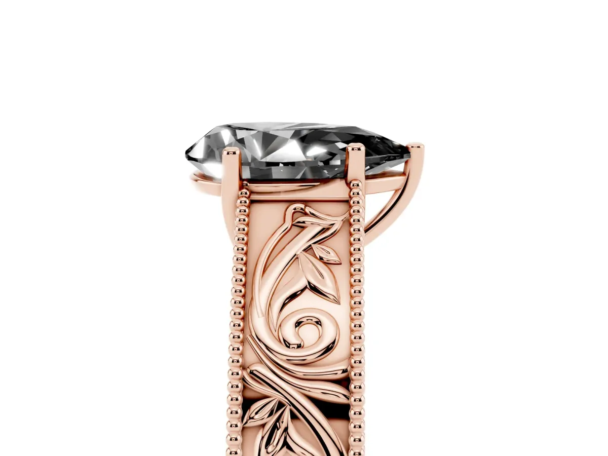 Fancy Black Pear Cut Diamond Solitaire Ring with Engraved Band and Four-Prong Setting Rose gold