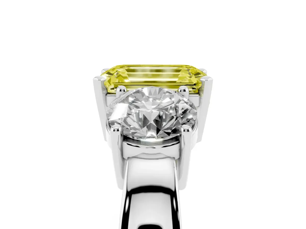 Fancy Yellow Three-Stone Emerald Cut Diamond Ring with Round Side Stones, Classic Band, and Four-Prong Setting Silver