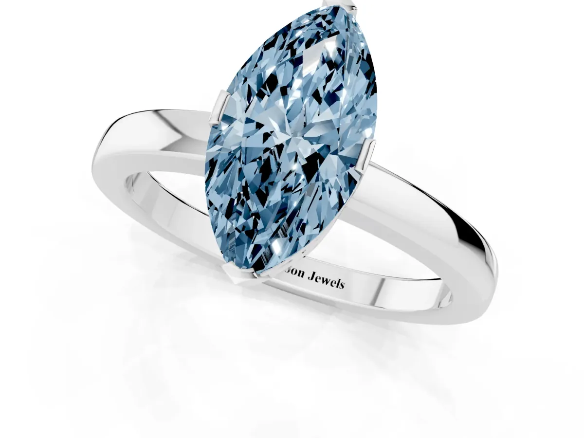 Fancy Blue Marquise Cut Cut Solitaire Ring with Four-Prong Setting and Classic Band Silver