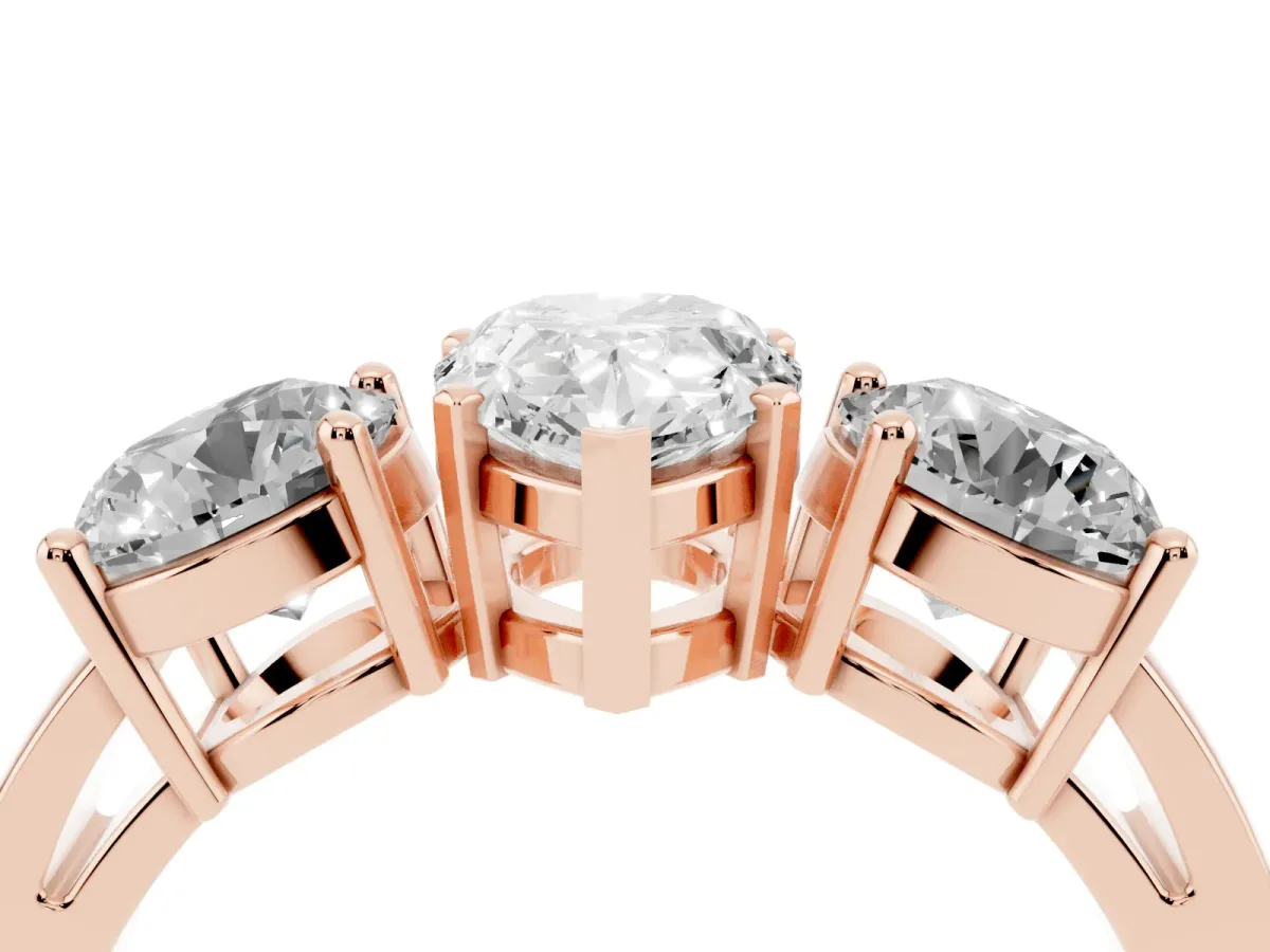 Three-Stone Pear Cut Diamond Ring with Round Side Stones, Classic Band, and Four-Prong Setting Rose gold