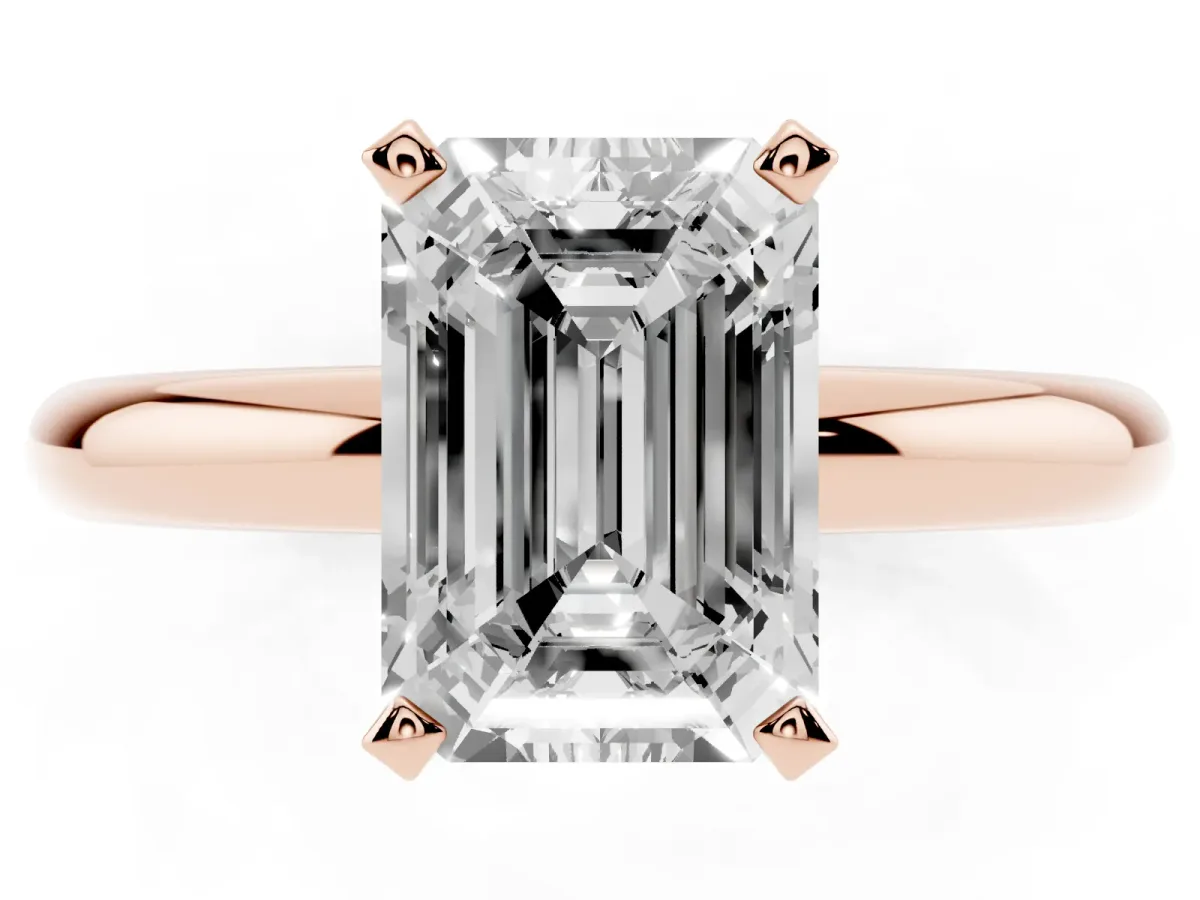 Emerald Cut Diamond Solitaire Engagement Ring with Round Band and Four-Prong Setting Rose gold