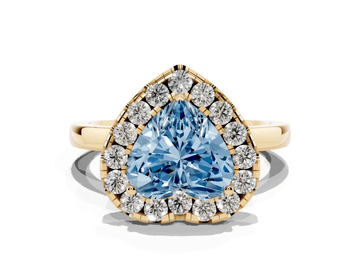 Fancy Blue Heart Cut Halo Diamond Solitaire with Pavé Band and Four-Prong Setting Yellow gold